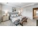 Comfortable main bedroom with stylish decor and accent lighting creating a relaxing space at 7144 Hodges Meadow Ln, Charlotte, NC 28213