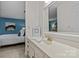 Open ensuite bath showcasing a vanity with white countertops and bathroom entrance at 9607 Stoney Hill Ln, Charlotte, NC 28277