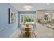 Bright kitchen nook featuring a round table with bay window views and granite countertops at 9607 Stoney Hill Ln, Charlotte, NC 28277