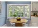 Charming kitchen nook with bay window providing ample natural light and wooded views at 9607 Stoney Hill Ln, Charlotte, NC 28277