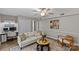 Relaxing living room featuring a comfortable couch, workspace and stylish decor at 9607 Stoney Hill Ln, Charlotte, NC 28277