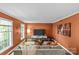 Cozy living room featuring stylish decor, a comfortable sofa, and natural light at 9607 Stoney Hill Ln, Charlotte, NC 28277