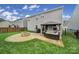 Backyard oasis with patio, fire pit, and gazebo, perfect for outdoor entertaining and relaxation at 1018 Hinson Forest Rd, Monroe, NC 28110