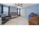 Comfortable bedroom with a rocking chair and a crib, perfect for a Bedroom or young room at 1018 Hinson Forest Rd, Monroe, NC 28110