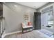 Inviting entryway featuring a storage bench with decor and light gray walls and wood-look flooring at 1018 Hinson Forest Rd, Monroe, NC 28110