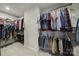 Large walk-in closet providing ample storage with double hanging rods and shelving at 1018 Hinson Forest Rd, Monroe, NC 28110