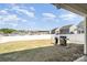 Spacious, well-fenced backyard with patio area, perfect for entertaining and outdoor enjoyment, grill included at 108 Toxaway St, Mooresville, NC 28115