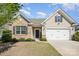 Charming single-Gathering home with brick and siding, manicured lawn, and an attached two-car garage at 108 Toxaway St, Mooresville, NC 28115