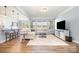 Spacious living room with lots of natural light and open floor plan perfect for Gathering and entertaining at 108 Toxaway St, Mooresville, NC 28115
