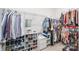 Spacious walk-in closet with ample storage, shelving, and clothing racks for organization at 108 Toxaway St, Mooresville, NC 28115