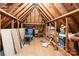 Spacious attic interior with exposed beams and stored belongings at 1116 Landons Ct, China Grove, NC 28023