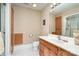Bathroom featuring a single sink vanity, toilet, and shower with neutral colored walls at 1116 Landons Ct, China Grove, NC 28023