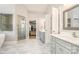 The primary bath features marble floors, dual sinks, walk-in shower and a large walk-in closet at 1116 Landons Ct, China Grove, NC 28023