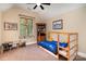 Bedroom featuring a bunk bed, a window, and a small desk area at 1116 Landons Ct, China Grove, NC 28023