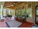 Inviting covered porch features an outdoor seating area, perfect for relaxing and entertaining guests at 1116 Landons Ct, China Grove, NC 28023