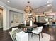 View of dining area and kitchen showing open floor plan at 11447 Egrets Point Dr, Charlotte, NC 28278