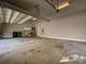 Spacious garage with ample room for parking and storage, complete with functional utility installations at 11447 Egrets Point Dr, Charlotte, NC 28278