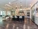 Modern kitchen with an island, stainless steel appliances, and sleek cabinetry, ideal for cooking and dining at 11447 Egrets Point Dr, Charlotte, NC 28278