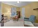 Cozy home office with a desk, comfortable seating, and natural light from the window at 117 Heath Ln, Mooresville, NC 28117