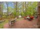 Spacious outdoor brick patio with ample seating and a well-maintained lawn at 117 Heath Ln, Mooresville, NC 28117