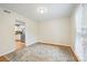 Spacious living room with light walls, wood floors, and a large window that provides natural light at 11700 Fernhurst Ln, Charlotte, NC 28277