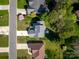 Aerial view of a well-maintained home with mature trees and lush landscaping at 121 Shagbark Ln, Mooresville, NC 28115