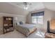 Bedroom with sloped ceilings, a ceiling fan, and a window providing ample natural light at 121 Shagbark Ln, Mooresville, NC 28115