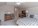 Bedroom featuring a plaid bedspread and bookshelf at 121 Shagbark Ln, Mooresville, NC 28115