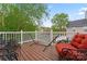View of the back deck with outdoor seating, ideal for relaxing and enjoying the outdoors at 12905 Bullock Greenway Blvd, Charlotte, NC 28277