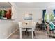 Dining room area features a white table with six chairs and decorative art at 12905 Bullock Greenway Blvd, Charlotte, NC 28277