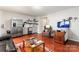 Cozy living room with stainless steel appliances, hardwood floors, and a comfortable seating area at 12905 Bullock Greenway Blvd, Charlotte, NC 28277