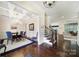 Elegant dining room showcasing hardwood floors, coffered ceilings, and wainscoting details at 141 Forsythia Ln, Tega Cay, SC 29708