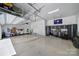 A spacious garage featuring ample storage solutions, a well-organized layout, and a convenient work area at 141 Forsythia Ln, Tega Cay, SC 29708