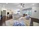 Open living area with hardwood floors, an adjacent kitchen, and plenty of natural light at 141 Forsythia Ln, Tega Cay, SC 29708