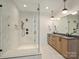 This stylish bathroom features a glass shower enclosure and double vanity sinks at 1523 Saint George St, Charlotte, NC 28205
