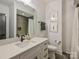 Contemporary bathroom with a modern vanity and tiled shower with a glass door at 1523 Saint George St, Charlotte, NC 28205