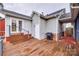 Exterior view of the back of the house with a spacious wooden deck and a grill at 1545 Wimbleton Woods Dr, Fort Mill, SC 29708