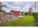 Backyard with a lawn and a fenced shed at 1545 Wimbleton Woods Dr, Fort Mill, SC 29708