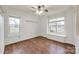 Bedroom featuring hardwood flooring, natural light, a built in window seat, and a ceiling fan at 1545 Wimbleton Woods Dr, Fort Mill, SC 29708
