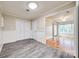Bright dining room with a hardwood floors, wainscoting and a view to the bonus room at 1545 Wimbleton Woods Dr, Fort Mill, SC 29708