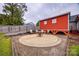 Backyard with a concrete slab and a fire pit with seating at 1545 Wimbleton Woods Dr, Fort Mill, SC 29708