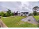 Charming home with a well-manicured front lawn and a driveway at 1545 Wimbleton Woods Dr, Fort Mill, SC 29708