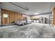 Spacious garage interior featuring a classic car, concrete floors, and storage solutions at 1545 Wimbleton Woods Dr, Fort Mill, SC 29708