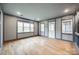 Bright living room with hardwood floors, natural light, and contemporary finishes at 1545 Wimbleton Woods Dr, Fort Mill, SC 29708