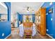 Charming dining room with hardwood floors, bright blue walls, and a cozy atmosphere at 1756 Martin Rd, Kings Mountain, NC 28086