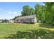 Charming single-story home with well-manicured lawn and mature trees. A cozy home in a quiet neighborhood at 1756 Martin Rd, Kings Mountain, NC 28086