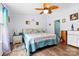 Cozy main bedroom features a ceiling fan, wood flooring and windows at 1756 Martin Rd, Kings Mountain, NC 28086