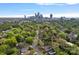 A birds-eye view of the neighborhood with a skyline in the background at 1801 Wilmore Dr, Charlotte, NC 28203