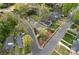 Scenic aerial view of the home nestled in a tree-lined neighborhood on a corner lot at 1801 Wilmore Dr, Charlotte, NC 28203