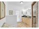 Bright bathroom featuring tile floors, a dual vanity, and neutral decor at 1801 Wilmore Dr, Charlotte, NC 28203